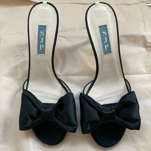 SJP by Sarah Jessica Parker bow tie black heels. Worn once, perfect condition.